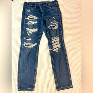 Like New American Eagle Ripped Skinny Jeans. 14R Medium Blue. Stretch